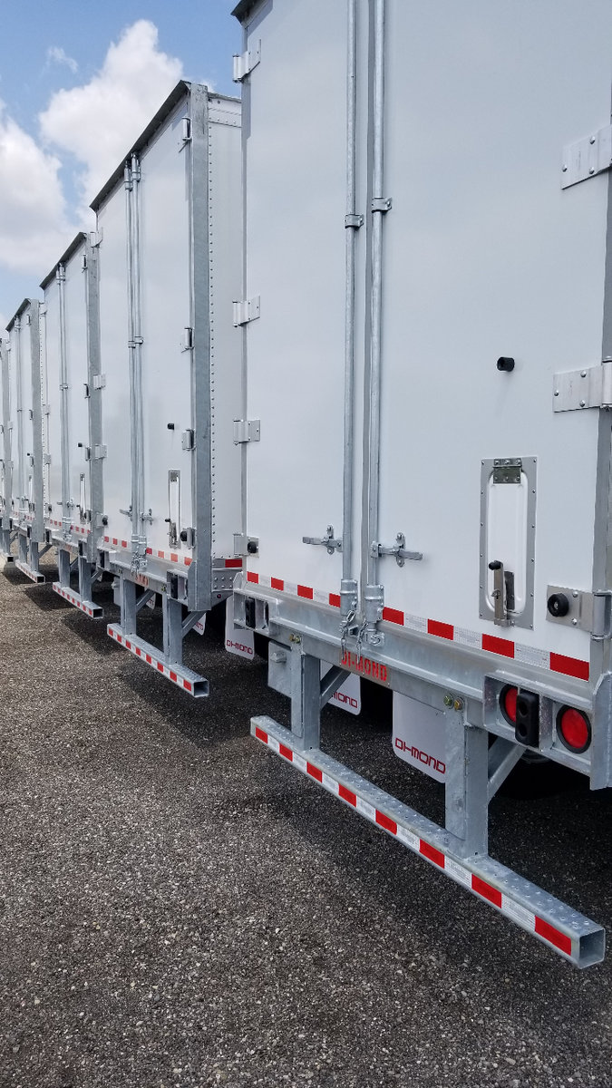 Row of the back end of trucks